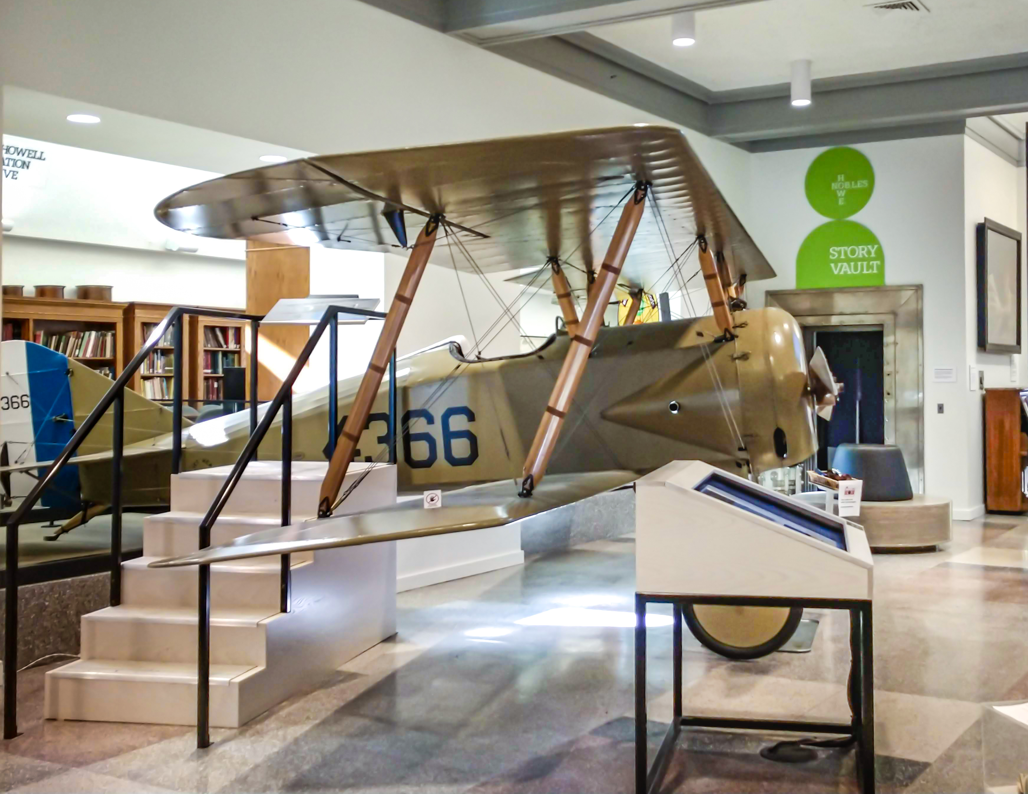 A rectangular photo of the Tommy Plane inside The History Center.